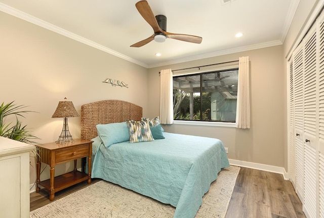 5118 Concord Pl, Carpinteria, CA 93013 - bedroom with wood finished floors, recessed lighting, a closet, ornamental molding, and a ceiling fan