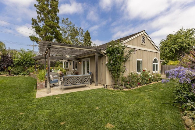 5118 Concord Pl, Carpinteria, CA 93013 - back of property with a pergola, an outdoor living space, a patio, and board and batten siding