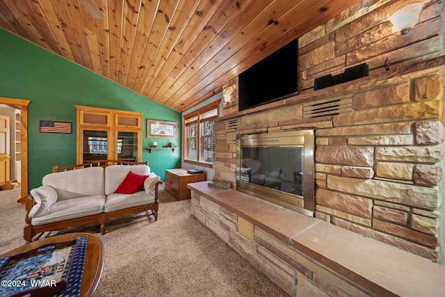 living area featuring lofted ceiling, carpet floors, a fireplace, and wood ceiling