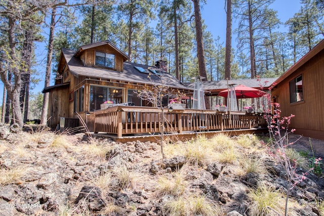 1862 Douglas Fir Dr, Pinetop, AZ 85935 - back of property featuring a wooden deck and a chimney
