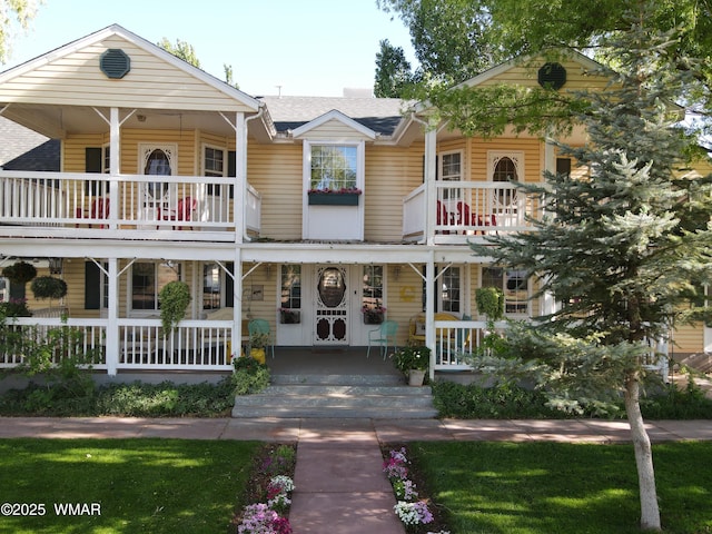 7525 E E Sherwood Rd, Snowflake, AZ 85937 - view of front of house with covered porch and a balcony