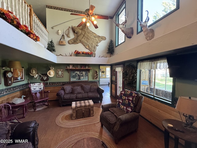 7525 E E Sherwood Rd, Snowflake, AZ 85937 - living room featuring a high ceiling, a ceiling fan, and wood finished floors