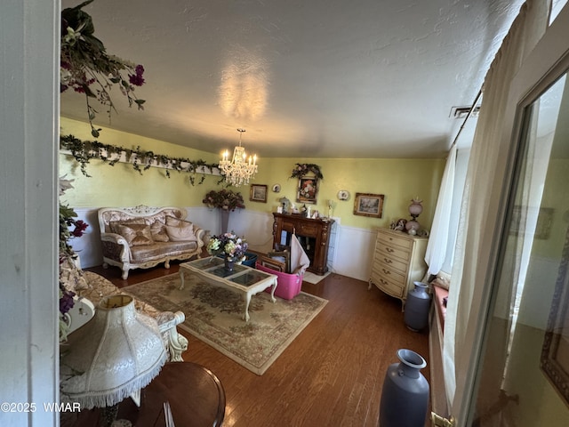 7525 E E Sherwood Rd, Snowflake, AZ 85937 - living room featuring a chandelier and wood finished floors