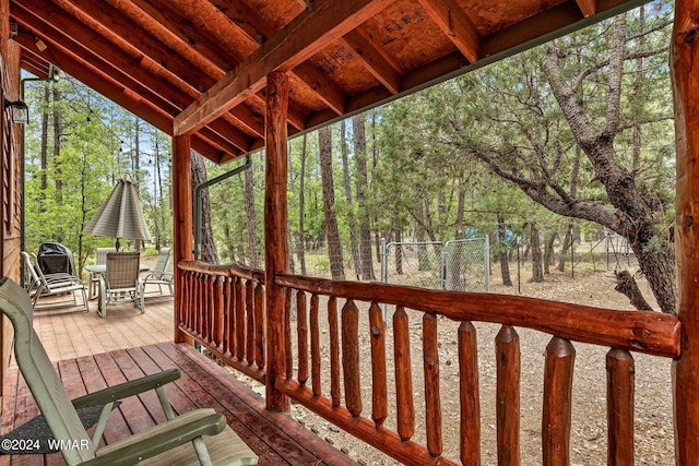 deck with outdoor dining space