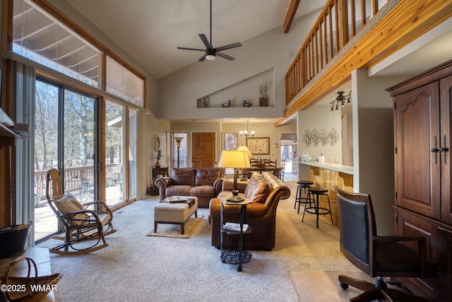 5712 Spruce Cir, Pinetop, AZ 85935 - living room with high vaulted ceiling, ceiling fan with notable chandelier, and light colored carpet