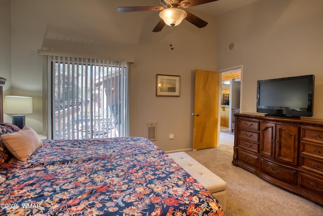 5712 Spruce Cir, Pinetop, AZ 85935 - bedroom featuring light carpet, ceiling fan, a towering ceiling, and baseboards