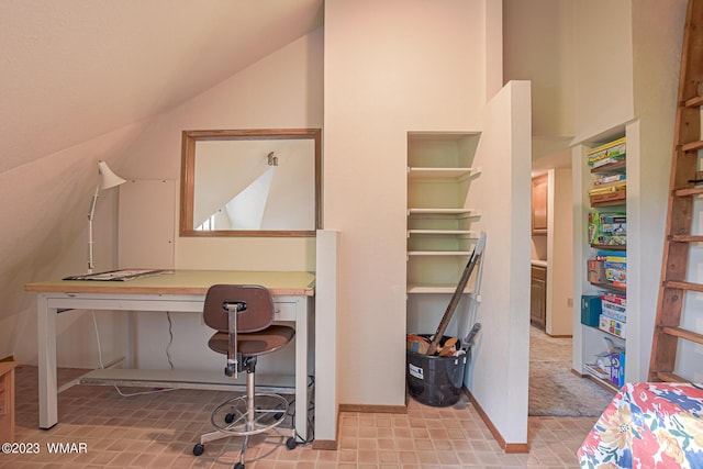 home office with vaulted ceiling