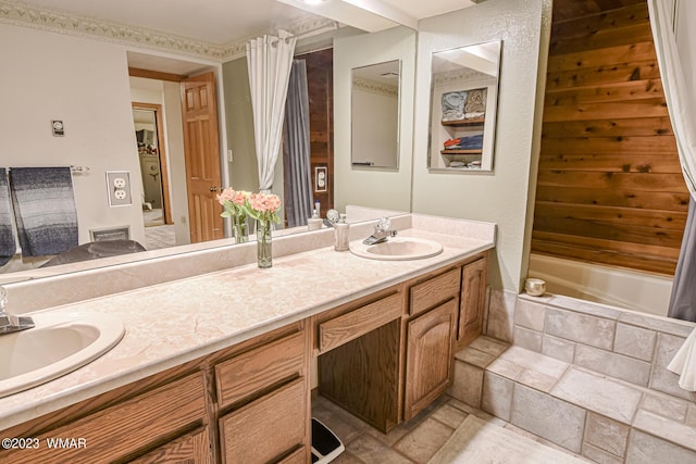 full bathroom with double vanity, a sink, and shower / tub combo with curtain