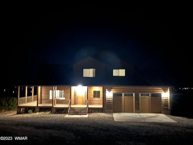 view of front of property featuring a garage