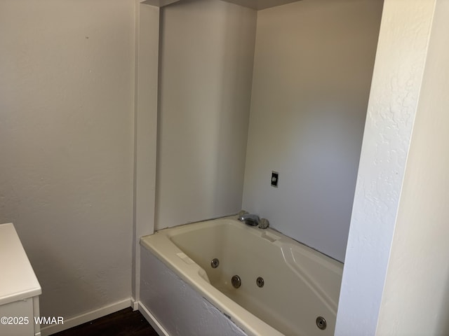 201 E Mcneil, Show Low, AZ 85901 - full bathroom with a whirlpool tub, wood finished floors, and vanity