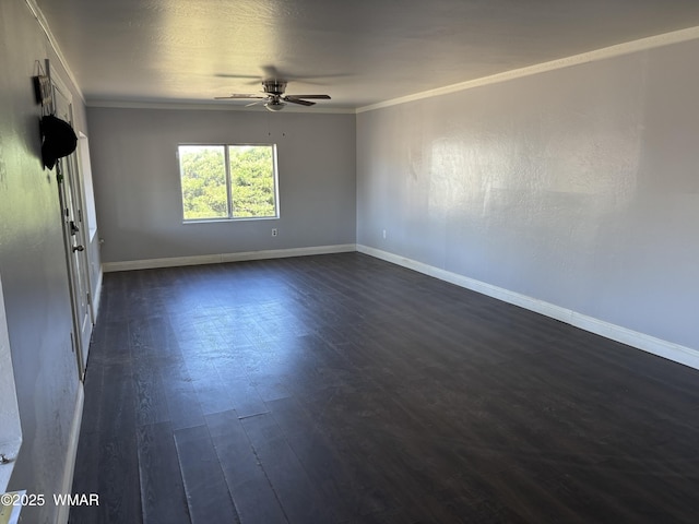 201 E Mcneil, Show Low, AZ 85901 - spare room featuring ceiling fan, dark wood-style flooring, and crown molding