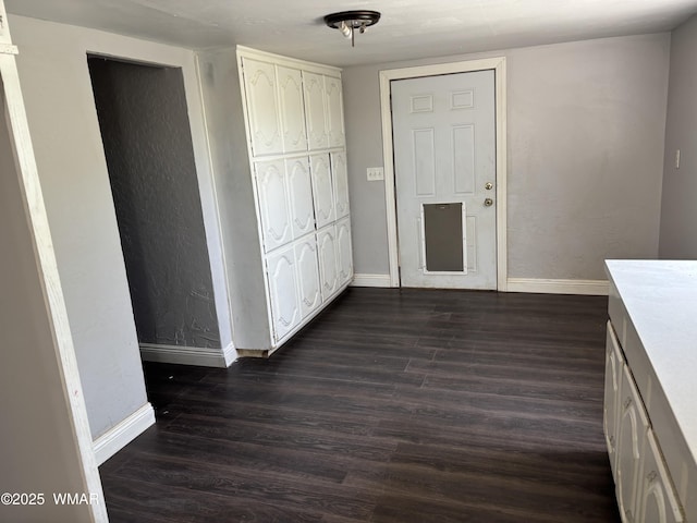 201 E Mcneil, Show Low, AZ 85901 - hall with baseboards and dark wood finished floors