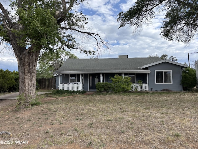 201 E Mcneil, Show Low, AZ 85901 - single story home with covered porch and a shingled roof