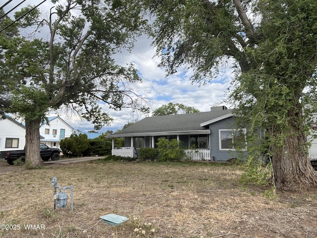 201 E Mcneil, Show Low, AZ 85901 - view of front of home featuring roof with shingles