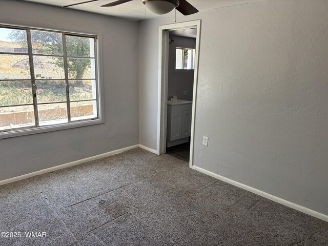 201 E Mcneil, Show Low, AZ 85901 - carpeted empty room with a ceiling fan, healthy amount of natural light, and a textured wall