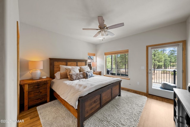 3050 W Black Oak Loop, Show Low, AZ 85901 - bedroom with access to exterior, light wood finished floors, baseboards, and a ceiling fan