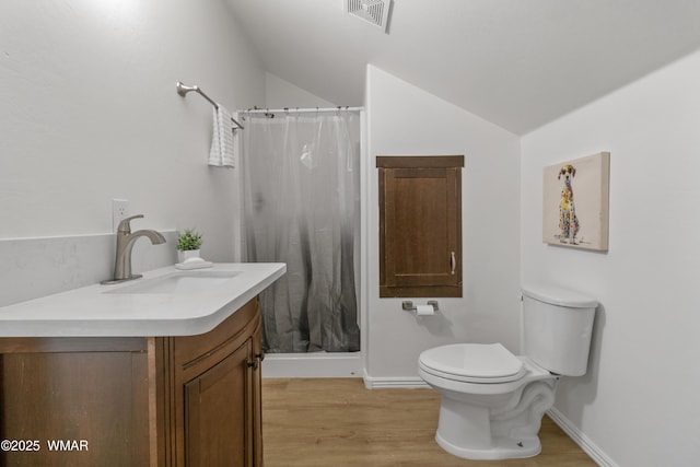 3401 W Hansen, Show Low, AZ 85901 - full bath featuring lofted ceiling, toilet, a stall shower, wood finished floors, and vanity