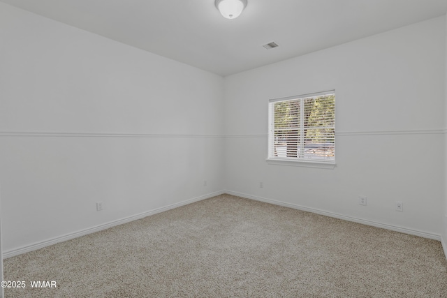 3401 W Hansen, Show Low, AZ 85901 - carpeted empty room featuring baseboards