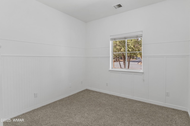 3401 W Hansen, Show Low, AZ 85901 - spare room with carpet floors and baseboards