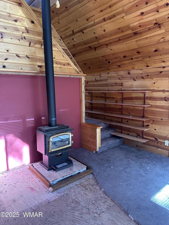 5528 Deer Run, Pinedale, AZ 85934 - detailed view of wood ceiling, a wood stove, and carpet floors