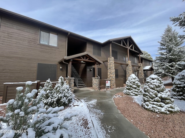 view of front of home featuring stone siding