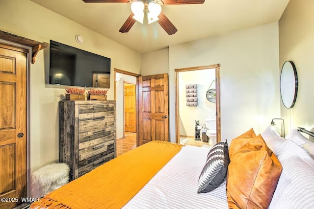 bedroom featuring ceiling fan and connected bathroom