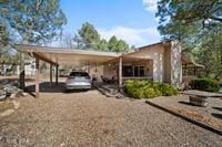 view of parking with a carport