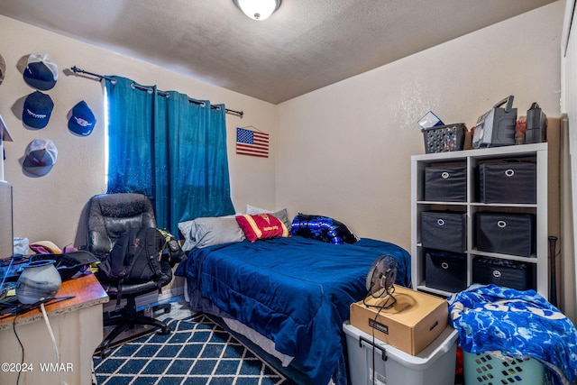 bedroom with a textured ceiling