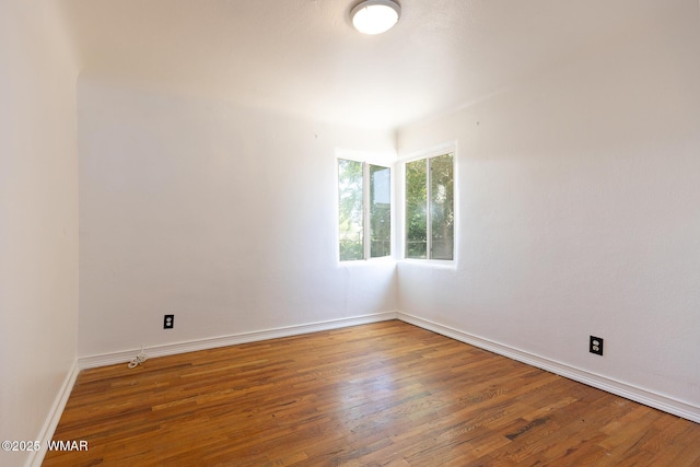 15 N 1st E St, Snowflake, AZ 85937 - spare room featuring wood finished floors and baseboards