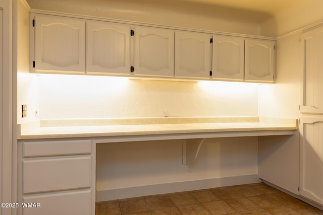 15 N 1st E St, Snowflake, AZ 85937 - kitchen featuring built in study area and white cabinets