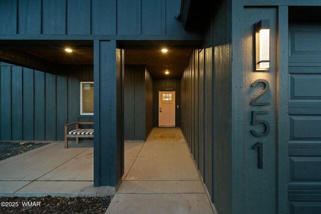 property entrance with board and batten siding