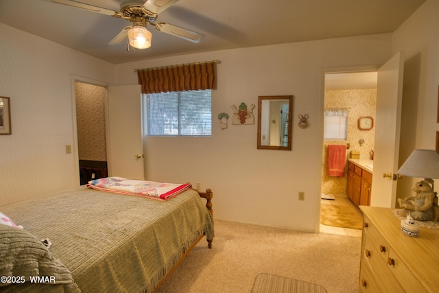 4300 W Burke, Show Low, AZ 85901 - bedroom featuring light colored carpet, ensuite bathroom, and ceiling fan