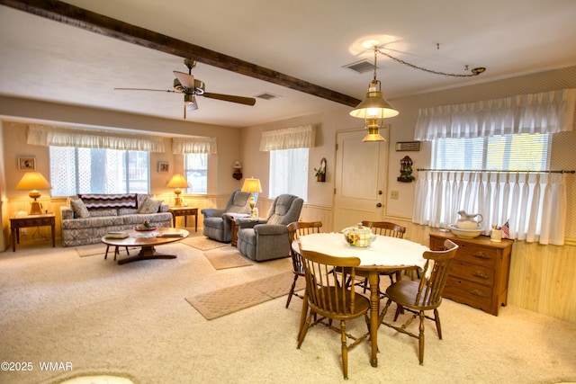 4300 W Burke, Show Low, AZ 85901 - dining area featuring carpet, wainscoting, a ceiling fan, wood walls, and beamed ceiling