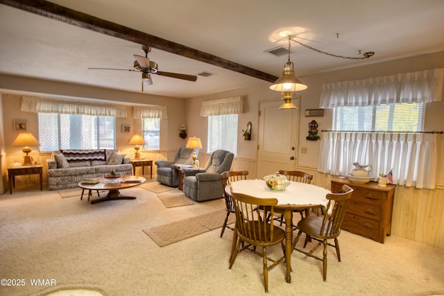 4300 W Burke, Show Low, AZ 85901 - dining space with carpet flooring, plenty of natural light, a wainscoted wall, ceiling fan, and wooden walls