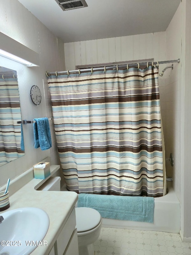 4300 W Burke, Show Low, AZ 85901 - bathroom featuring shower / bath combination with curtain, vanity, toilet, and tile patterned floors
