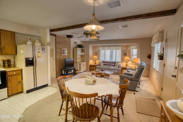 4300 W Burke, Show Low, AZ 85901 - dining space featuring beamed ceiling, a ceiling fan, and light carpet