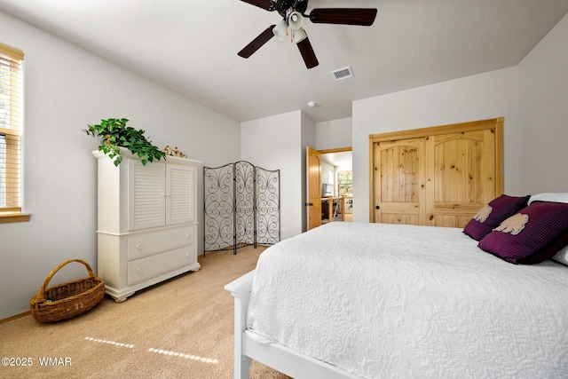 451 S Spirea Ln, Show Low, AZ 85901 - bedroom with light colored carpet and a ceiling fan