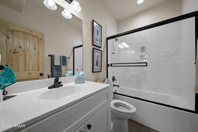 451 S Spirea Ln, Show Low, AZ 85901 - bathroom with vanity, bath / shower combo with glass door, toilet, and wood finished floors