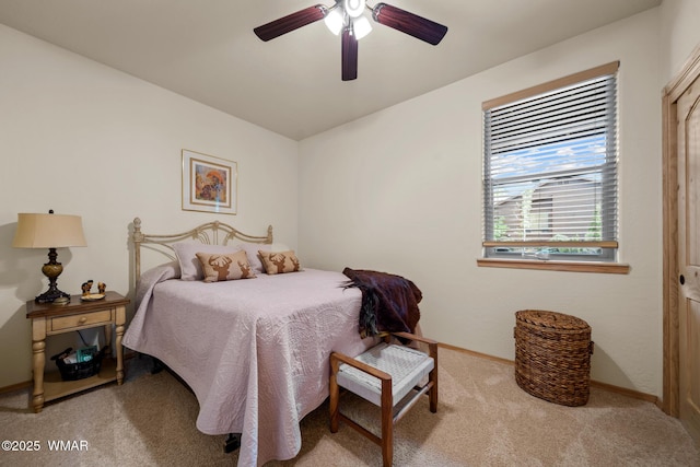 451 S Spirea Ln, Show Low, AZ 85901 - carpeted bedroom with baseboards and a ceiling fan