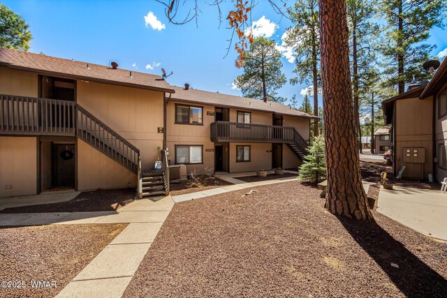 2670 Snow Slope Way, Pinetop, AZ 85935 - view of property's community with stairway and a deck