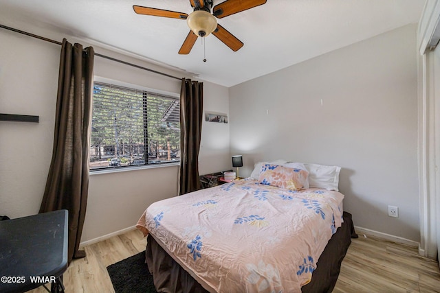 2670 Snow Slope Way, Pinetop, AZ 85935 - bedroom featuring light wood finished floors, baseboards, and ceiling fan
