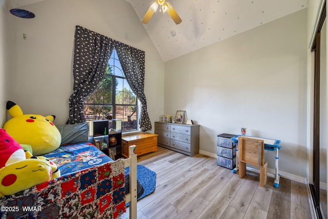 6853 Rim Rock Rd, Show Low, AZ 85901 - bedroom with lofted ceiling, wood finished floors, and a ceiling fan