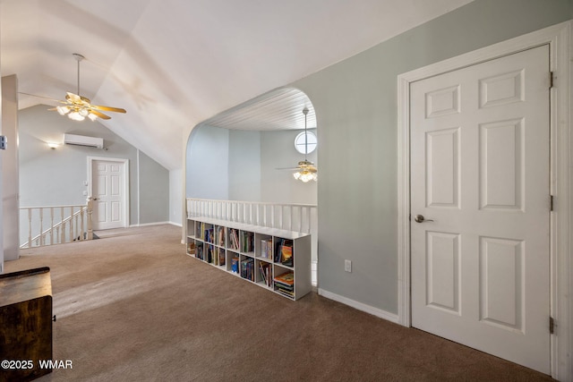 6853 Rim Rock Rd, Show Low, AZ 85901 - hallway featuring an upstairs landing, carpet flooring, vaulted ceiling, and an AC wall unit
