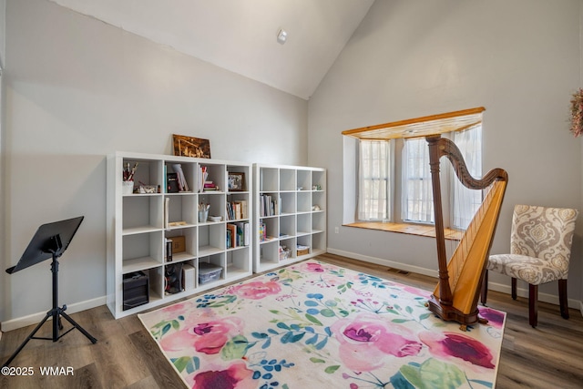 6853 Rim Rock Rd, Show Low, AZ 85901 - game room featuring wood finished floors and high vaulted ceiling