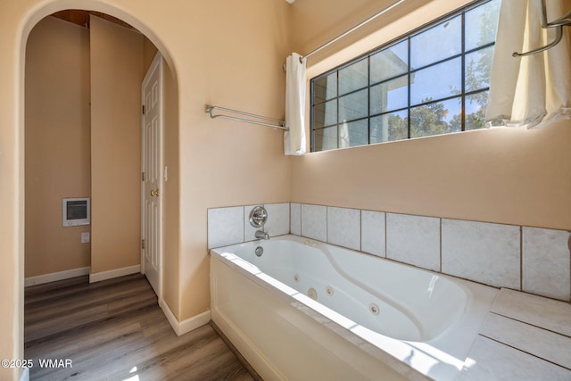 6853 Rim Rock Rd, Show Low, AZ 85901 - full bath featuring a tub with jets and wood finished floors