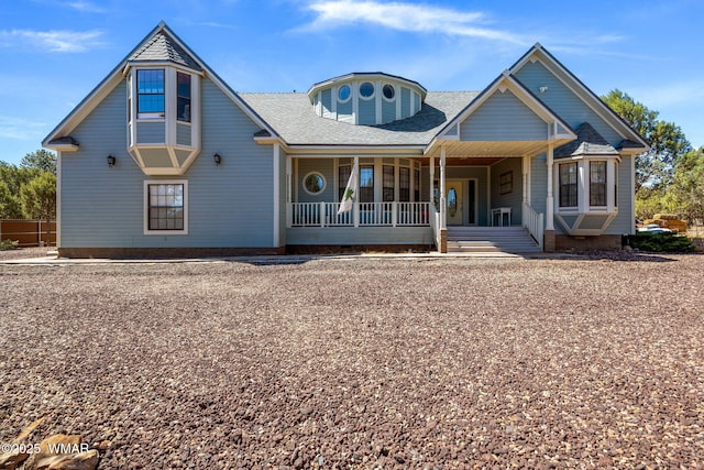 6853 Rim Rock Rd, Show Low, AZ 85901 - view of front of house with covered porch and roof with shingles