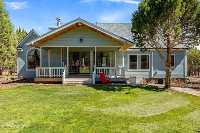 6853 Rim Rock Rd, Show Low, AZ 85901 - rear view of property with a lawn and covered porch