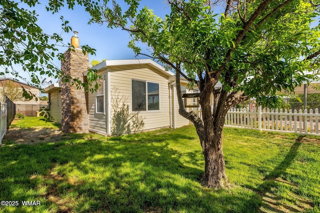 864 S 1st St E, Snowflake, AZ 85937 - view of home's exterior with a chimney