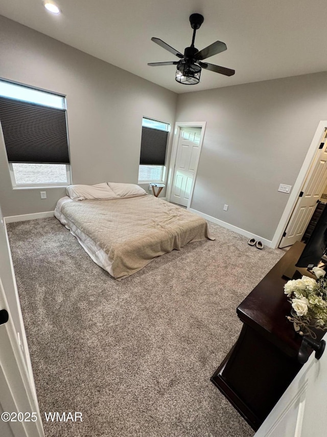 carpeted bedroom featuring recessed lighting, a ceiling fan, and baseboards