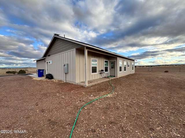 view of property exterior with board and batten siding